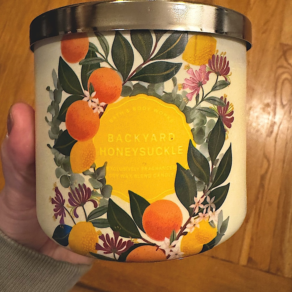 Bath & Body Works 3- wick candle in Backyard Honeysuckle